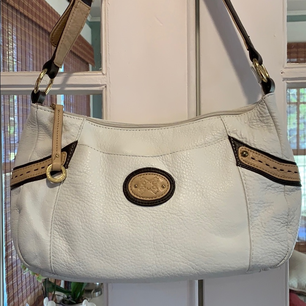 Cream colored leather bag with brown/tan detailing